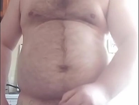 The gay man put his massive balls on the table and started masturbating his cock! hot daddy gay porn video